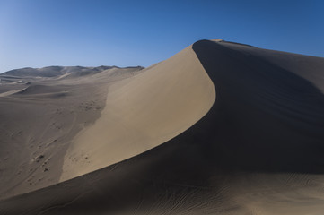 Fototapeta na wymiar Singing Sand，Dunhuang