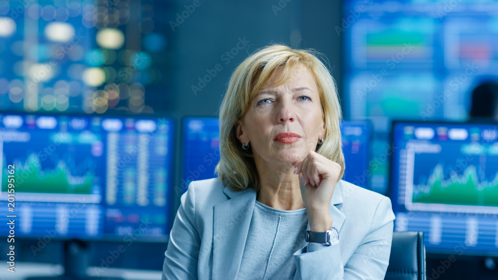 Poster stock market leading analyst thinking hard on solving financial problem. behind her people working a