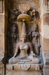 Carved stone idol on the outer wall of the Brihadishvara Temple, Thanjavur, Tamil Nadu, India