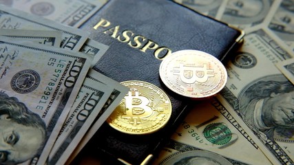 4K Diferent physical metal currency rotating over 100 dollar bill of United States. New worldwide virtual internet money with USA banknotes. Digital coin cyberspace, cryptocurrency. Online payment-Dan