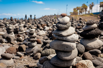 Stack of stones on the sea beach. Tenerife.