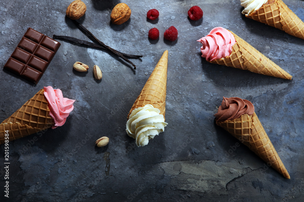 Wall mural Vanilla frozen yogurt or soft ice cream in waffle cone - Wall murals