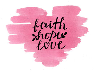 Hand lettering Faith, hope and love on watercolor heart.
