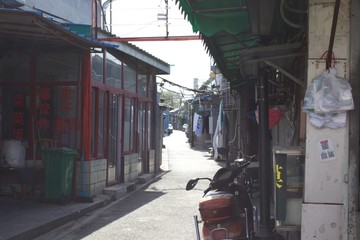 Naklejka premium Hutong Seitenstrasse am Laden