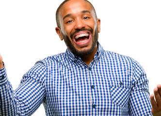 Obraz premium African american man with beard confident and happy with a big natural smile welcome gesture isolated over white background