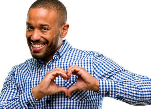 African american man with beard happy showing love with hands in heart shape expressing healthy and marriage symbol isolated over white background