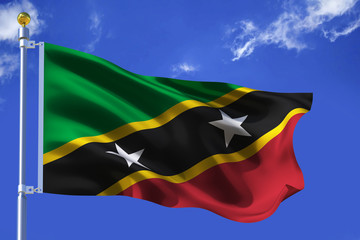 The silk waving flag of Saint Kitts and Nevis with a flagpole on a blue sky background with clouds .3D illustration..