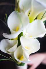 White calla lillies in bridal bouquet