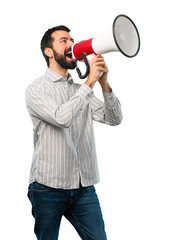 Handsome man with beard holding a megaphone