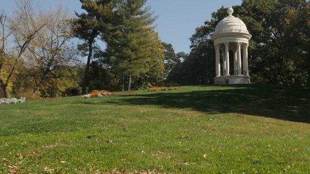 Tilting on public park hill with gazebo footage - Early autumn in Romanian city of Craiova 