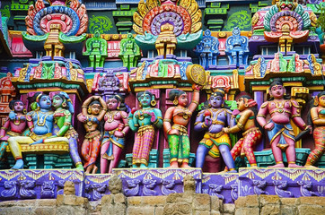 Colorful idols on the Gopuram, Sarangapani Temple, Kumbakonam, Tamil Nadu, India.