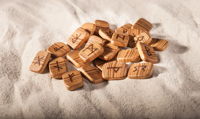 Runes foresight lying on the sand