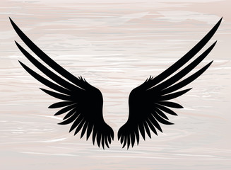 Wings. Vector illustration on wooden background. Black and white
