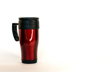 travel thermo mug in red on a white background