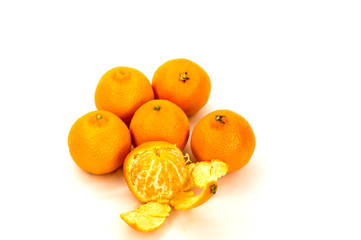 tangerines, citrus several pieces lie in different order on white background