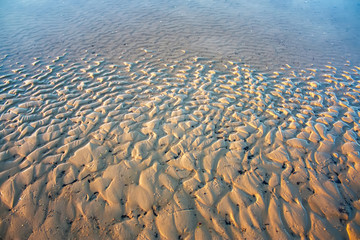 Sand pattern of a beach at summer