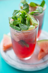 Glass with red refreshing lemonade