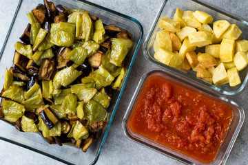 Turkish Food Kizartma / Fried Aubergine or Eggplant Slices with Tomato Paste Salsa Sauce and Cube Potatoes.