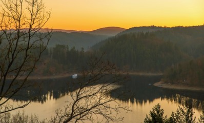 Dam Orlik in yellow sunrise.