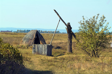 Fototapeta na wymiar Austria, Burgenland, draw well and hut in national park 