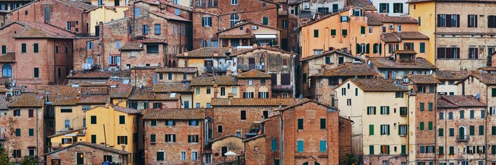 Fototapeta na wymiar Old building background Siena Italy