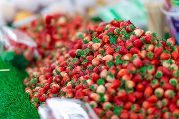 Many strawberries for sale at a market