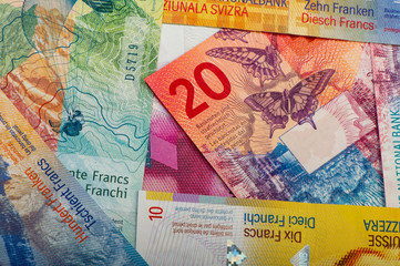 Swiss banknotes - a collection of old and new twenty franc notes.