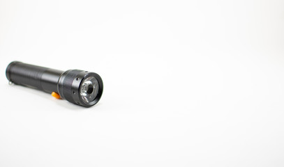 Black flashlight on white background. isolated.