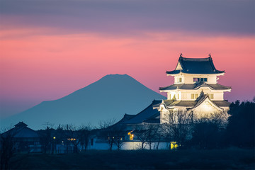 Sekiyado Castle and Mountain Fuji at sunset. Sekiyado Castle is a Japanese castle located in Noda, northwestern Chiba Prefecture, Japan. And Sekiyado Castle away from Mt. Fuji about 130 km.
