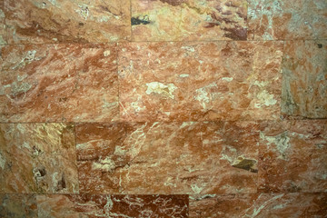 Natural pattern of polished beige and brown marble facing plate. Contemporary expressive element for wide range of design ideas in interior or graphic design.