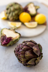 Obraz premium Healthy lifestyle. Artichokes on gray tabletop
