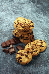 Chocolate cookies on rustic table. Chocolate chip cookies