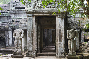 Ancient ruins of Preah Khan temple with stone carving, Siem Reap, Cambodia.