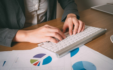 woman's hands working in office