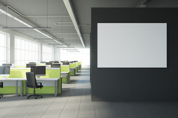 Contemporary coworking office with poster