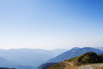 Fototapeta na wymiar skydiver in the mountains
