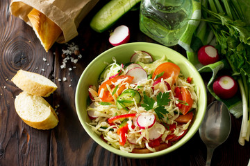 Healthy vegetarian bowl. Summer vegetarian vitamin salad with fresh vegetables. The concept of healthy and dietary nutrition.