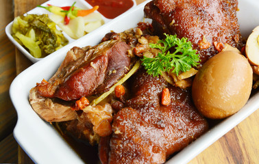 Braised pork leg or Thai style Stewed pork leg (Thai name is Kha Moo Pa Lo).
Pork leg street food menu in Thailand