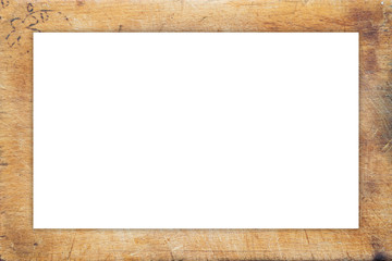 A textured wooden cutting board. Close-up view from top. White space for text and ideas.