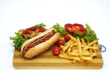 Hot dogs and French fries on white background.