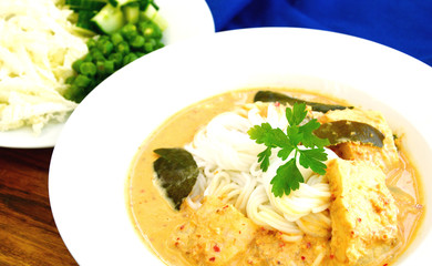 Rice noodles with fish and coconut curry sauce.(Thai name is Kanom Jeen Nam Ya Pla).
Traditional Thai rice noodles menu.
