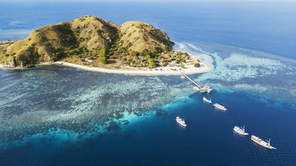 Exotic Kanawa island with aquamarine water © Creativa Images