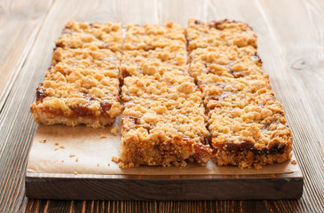 Apricot streusel pie on cutting board