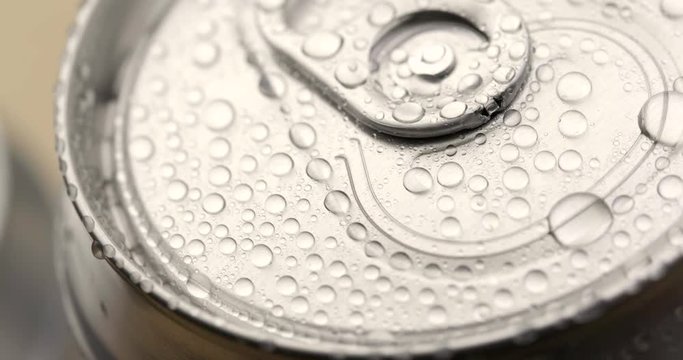 Water droplets on aluminum can of soda or beer