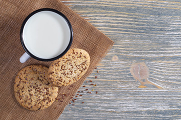 Mug with milk and cookies