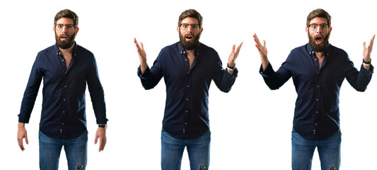 Young man with beard scared in shock, expressing panic and fear isolated over white background