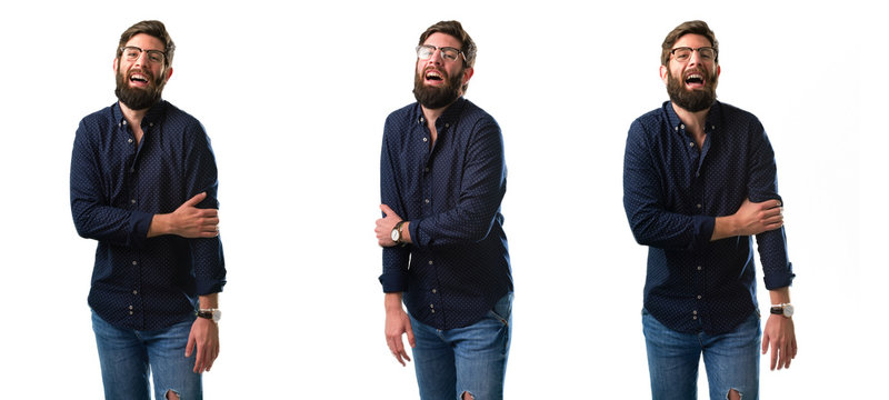 Young man with beard confident and happy with a big natural smile laughing isolated over white background