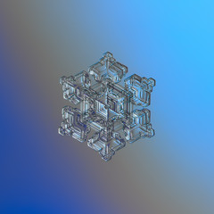 Snowflake glittering on smooth gradient background. Macro photo of real snow crystal: sectored plate with glossy relief surface, fine hexagonal symmetry, six tiny arms and complex inner pattern.