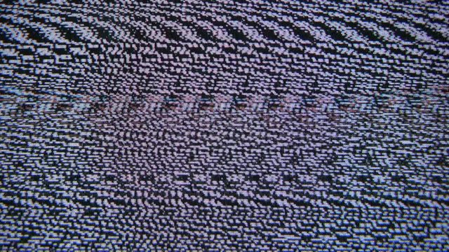 4K video footage of tv noise on screen, flickering analog tv signal