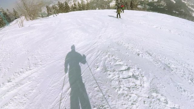 4K. Mountain skiing  in sunny day.Skier,skis,POV  clip